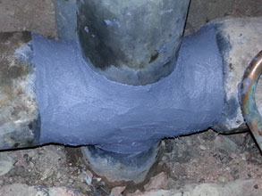 Sewage pipe sealed with Belzona 1291 (ES-Metal) and wrapped over with Belzona 1161 (Super UW-Metal)