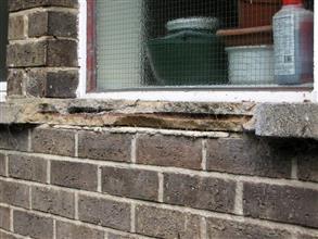 Damaged window sills due to corrosion of reinforcement bars